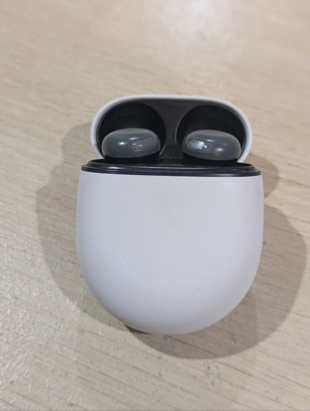 google True Wireless Earbuds with White Charging Case and Gray Earbuds